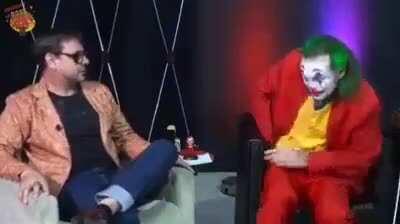 Joker cosplay scares TV program host