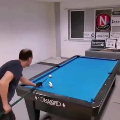 Pool player does amazing trickshots!