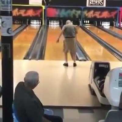 Old man bowling and he is very talented