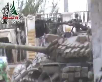 Houran Brigade targets a Syrian Army T-55 with an RPG in Daraa al-Balad - 2013