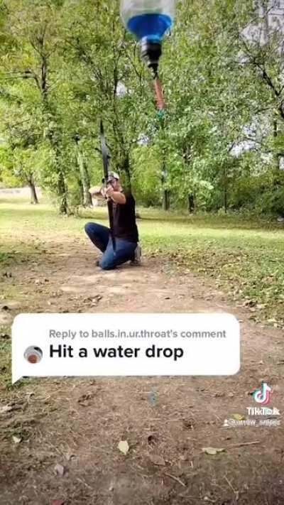 Archer hits a water droplet