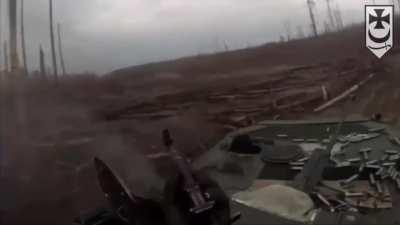 BMP-2 crew from the Bureviy National Guard Brigade repelling enemy infantry approaches detected near Ukrainian positions. Kremin forest, Luhansk region. (21/March/2024)