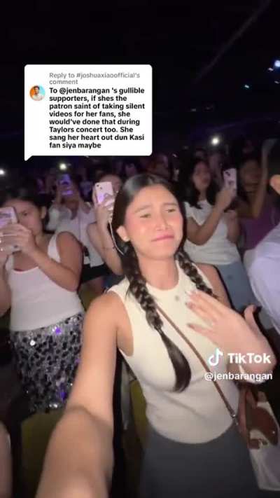 Some influencer recording herself with flash on during a concert