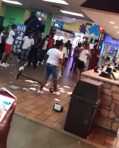 Kids start smashing up a fast food joint