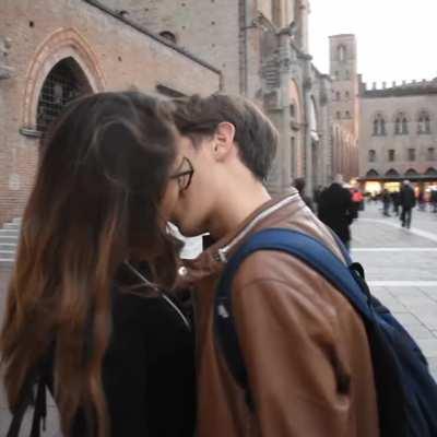 Italian guy kissing girl