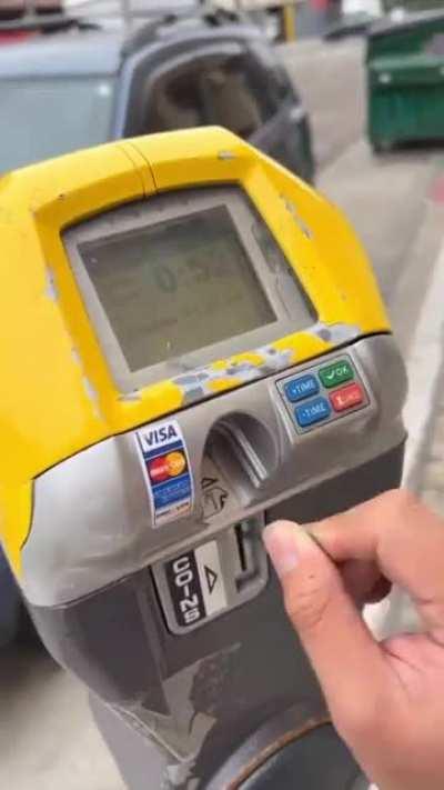 Hacking a parking meter with a coffee stirrer