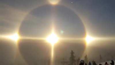 A Very rare solar halo appears over a mountain in Sweden.