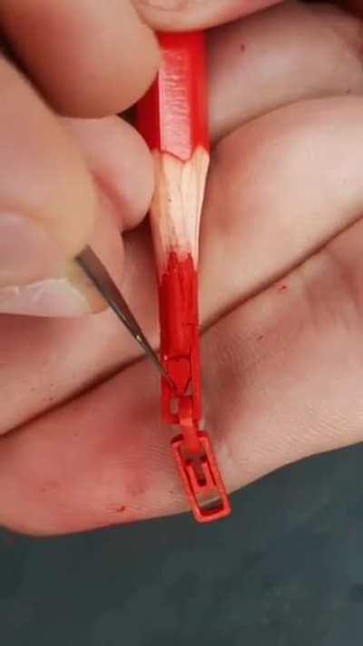 Artistic carving of color pencil lead.