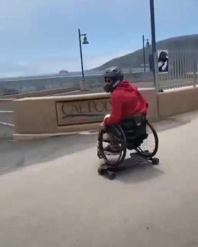 Skateboarding while in a wheelchair