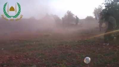 Syrian Opposition's 101st Inf Division using a captured howitzer as a direct fire weapon against SAA positions - 2014