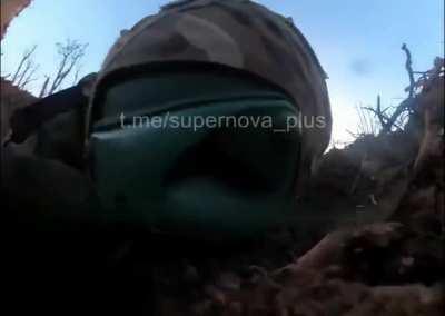 Russian soldier throws a grenade but the grenade hit a tree luckily his reaction time was fast. South direction.