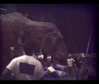 Behind the scenes of &quot;Jurassic Park&quot;, as the special effects team tests the animatronics for the full-size T-REX (the largest animatronic ever created by Stan Winston Studios)