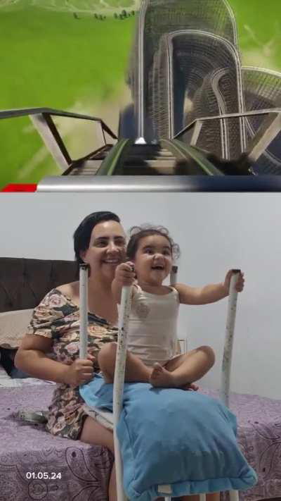 Mom amazes her toddler with an incredible roller coaster simulator