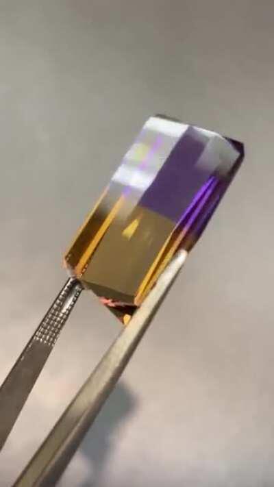 Natural Ametrine Crystals from Bolivia can have very defined &amp;amp; deep color zones of Amethyst and Citrine. I cut this gem to show a 50/50 split of amethyst &amp;amp; citrine.