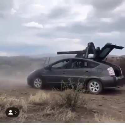 This fucking minigun Prius.