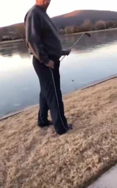 Sound of golf ball on frozen lake