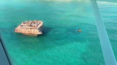 Partially Submerged Shipwreck in Lake Michigan [OC]