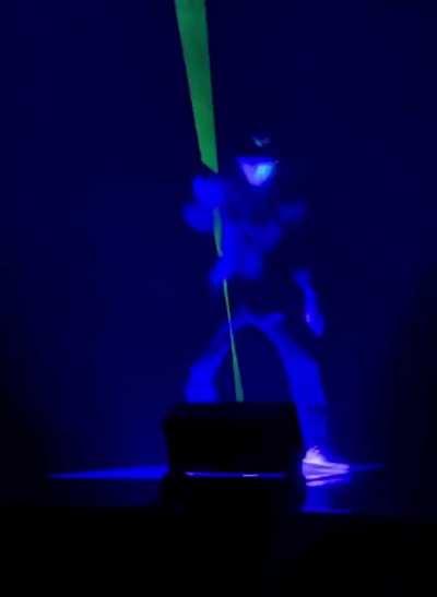 Precise coordination between lasers and the dancer's moves produces some great visual effects