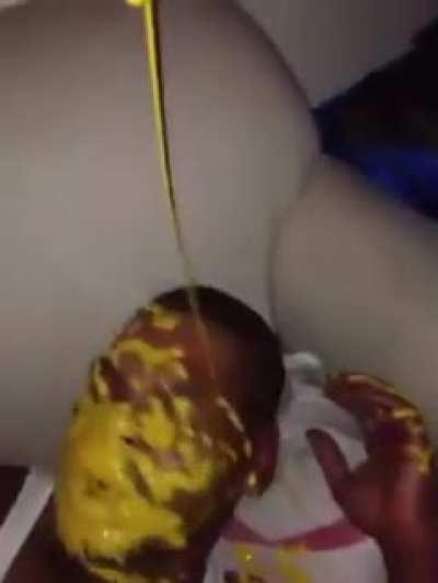 Guy pours mustard on other guys face while he’s sleeping