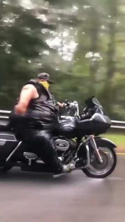 This absolute unit on a Harley bike