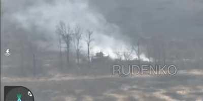 Russian drone footage of hitting a Bradley. Bradley is on fire but is able to manoeuvre