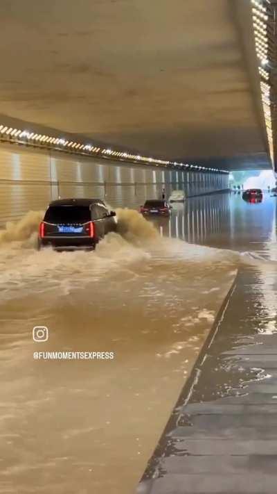 When you think your superior car is capable to drive across a flooding tunnel.