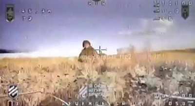 russian seems to give up and let an FPV drone fly into his face, from the 1st Mechanized Battalion of the Third assault brigade most likely the Kharkiv direction