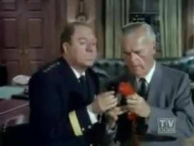 In a blast from the past, and by past I mean 1966, Batman has a conversation with Bruce Wayne in the presence of Commisioner Gordon and Chief O'Hara