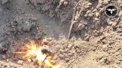 Strike Drone Company took out 2 Russian soldiers in a hole left from a glide bomb strike