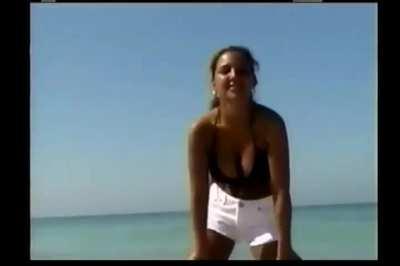 Christina Model - Black bikini and white shorts