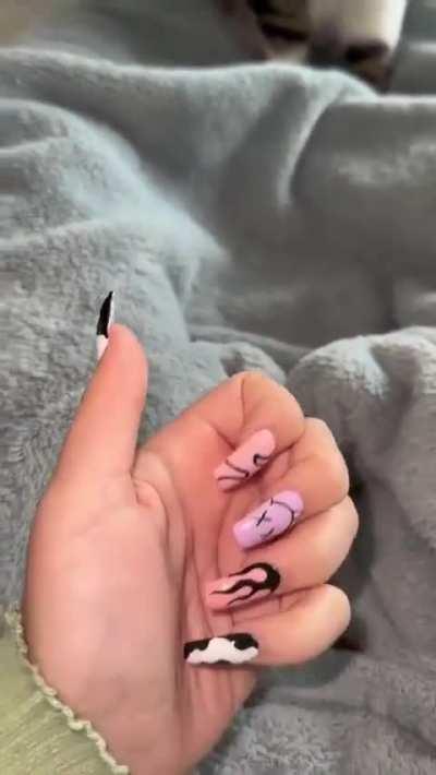 The infamous TikTok video of the “gosd7n01yj nails kitty video” - ORIGINAL.