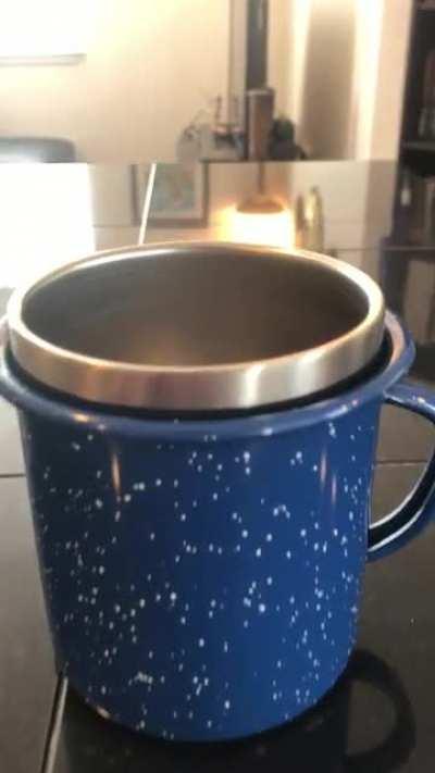 Discovered this perfect fit packing up my camp gear - thermal cup within enamel mug