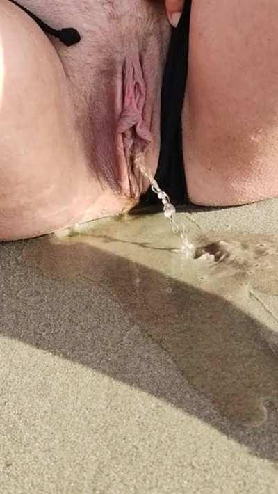 Sneaky beach pee