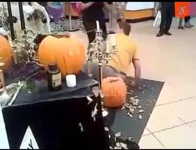 This is how to trick a trickster in halloween. Look how worried that lady in black. So unexpecting reaction though.