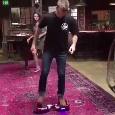 Kick flipping a hoverboard