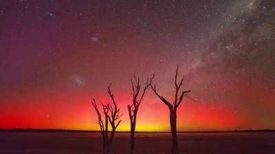 This spectacular Aurora Australis with the Milky Way in the background