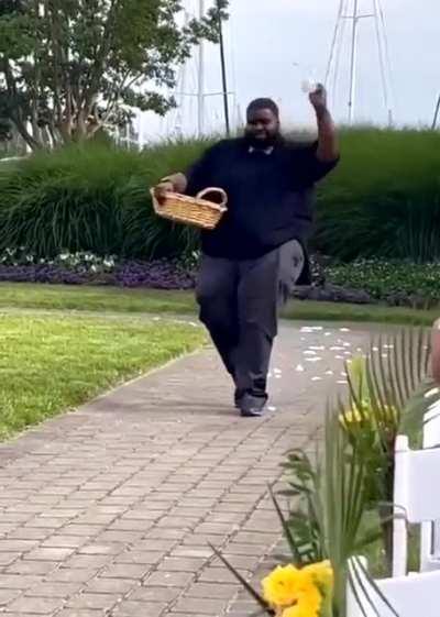 The way he tosses the flowers on beat