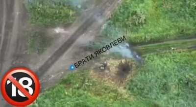 NSFW/NSFL - Direct hit on russian troops from ATGM. Birds eye view. Ukraine 2023