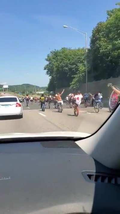 Riding bicycles recklessly on the highway