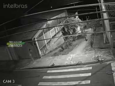 Guy running from police, cat running from dog, dude running from wife... Just another day in Brasil