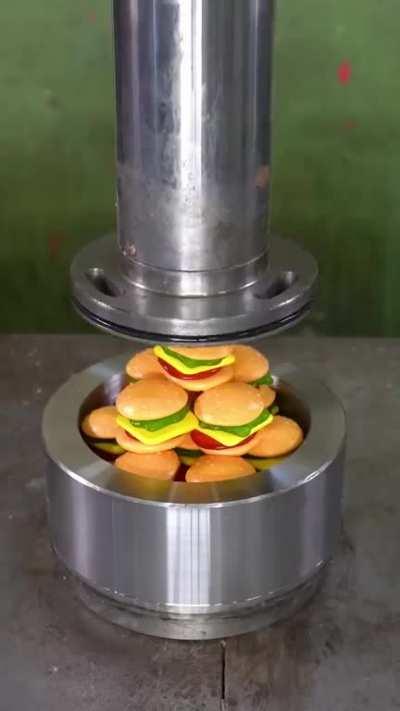 Candy Crushes With Hydraulic Press