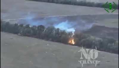 Ukrainian Drone attacking Russian position using unusual munition.