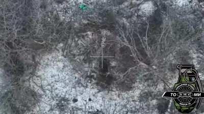 Ukrainian drone drops grenades on Russian soldiers in snow camouflage