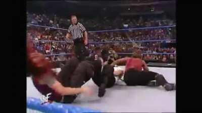 Ivory double teamed by Lita and Jacqueline