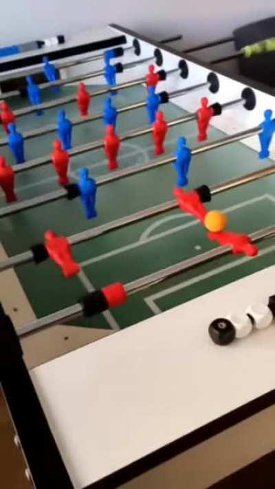 I’m not sure if this breaks the rules of foosball, but it was still a nice shot.