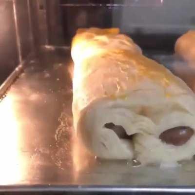 Puff pastry rising in the oven