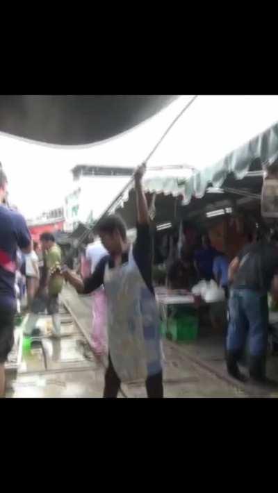 The Maeklong Railway Market AKA Umbrella pulldown market