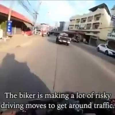 Biker sees a little girl having a seizure while stuck in a traffic jam, rushes both her and her father to a hospital on his motorcycle