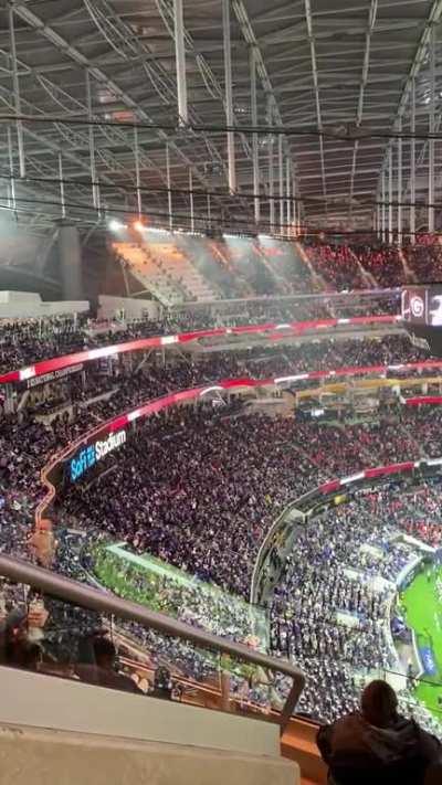 Because SoFi Stadium has a roof but no walls, rain is only coming down on the upper deck of TCU fans.