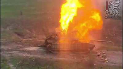 Burning Russian BMP-2 and tank